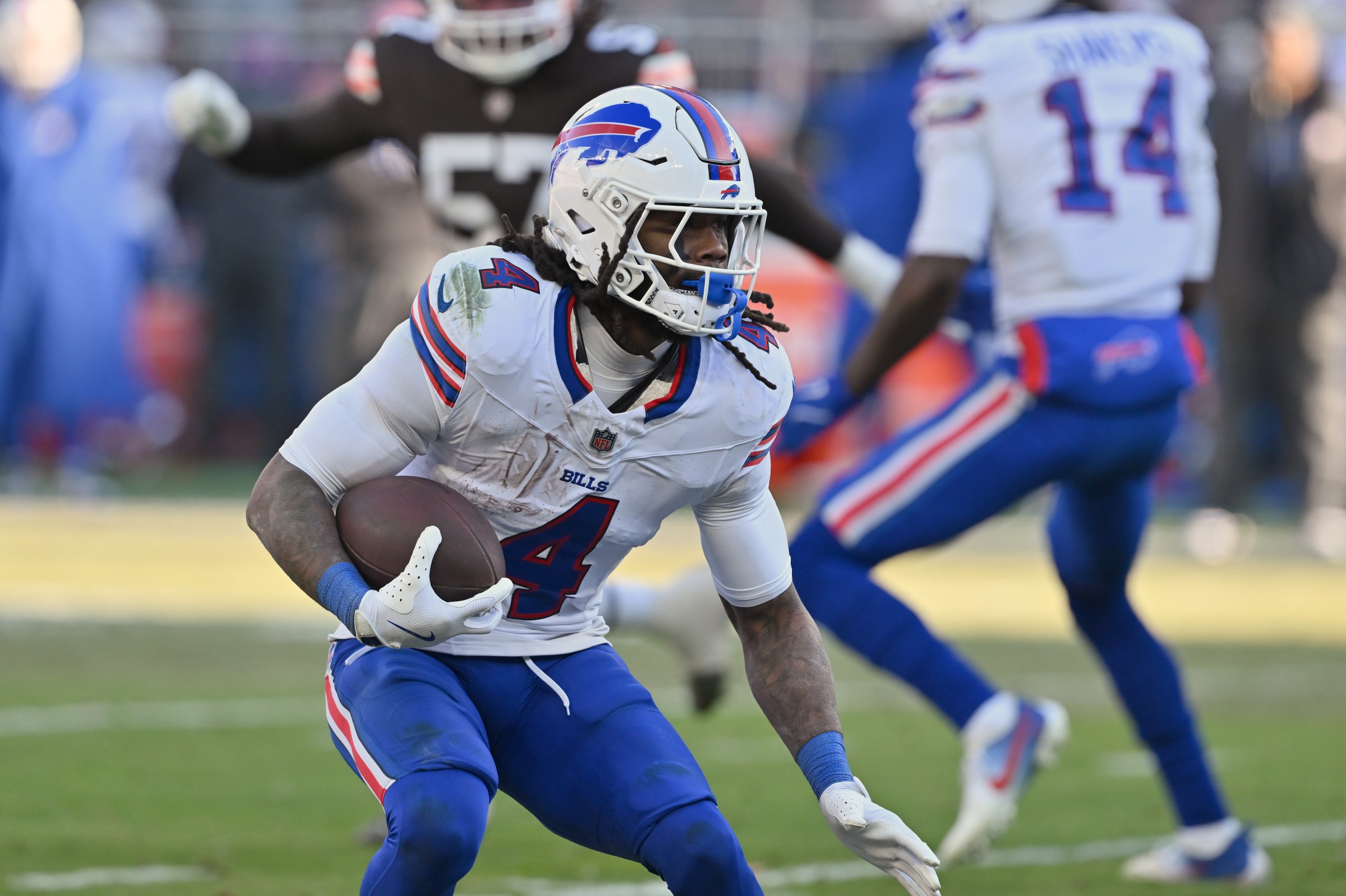 CLEVELAND, OHIO - DECEMBER 21: Running back James Cook III #4 of the Buffalo Bills runs the ball during the third quarter against the Cleveland Browns at Huntington Bank Field on December 21, 2025 in Cleveland, Ohio. The Bills defeated the Browns 23-20. (Photo by Jason Miller/Getty Images)