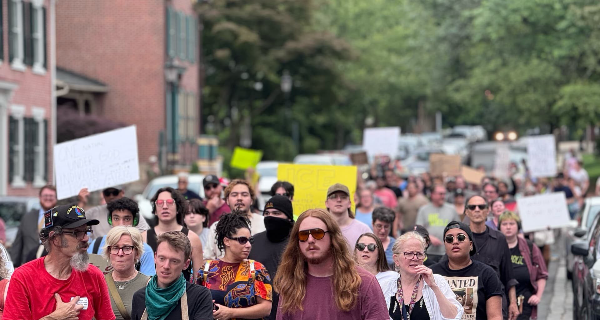 ice protesters march down church street in bethlehem pa on june 12 2025 a day after ice raid at 510 flats