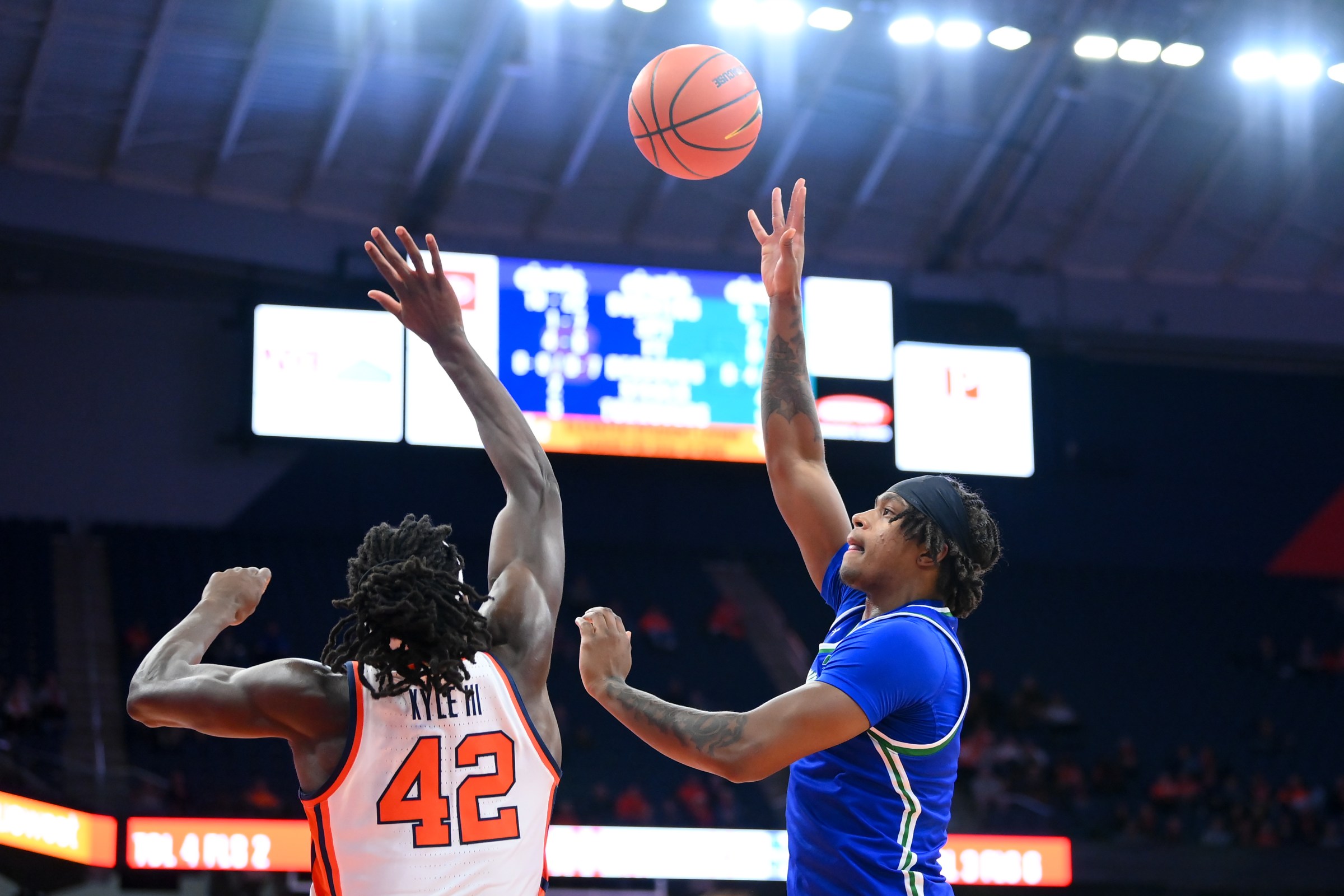 Dec 17, 2025; Syracuse, New York, USA; Mercyhurst Lakers forward Cameron Johnson (3) shoots against Syracuse Orange forward William Kyle III (42) during the first half at the JMA Wireless Dome. Mandatory Credit: Rich Barnes-Imagn Images