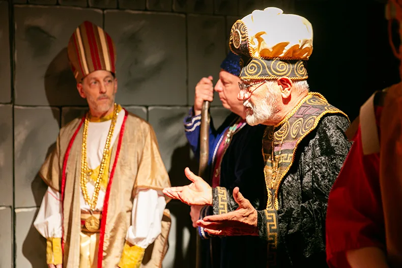 Three wise men tell King Herod about the star and the new king, who is believed to be a baby. 