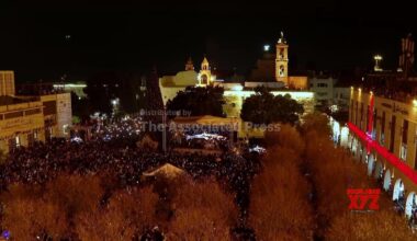 Hundreds flock to see Bethlehem Christmas tree lit up for first time since start of Gaza war (Video)