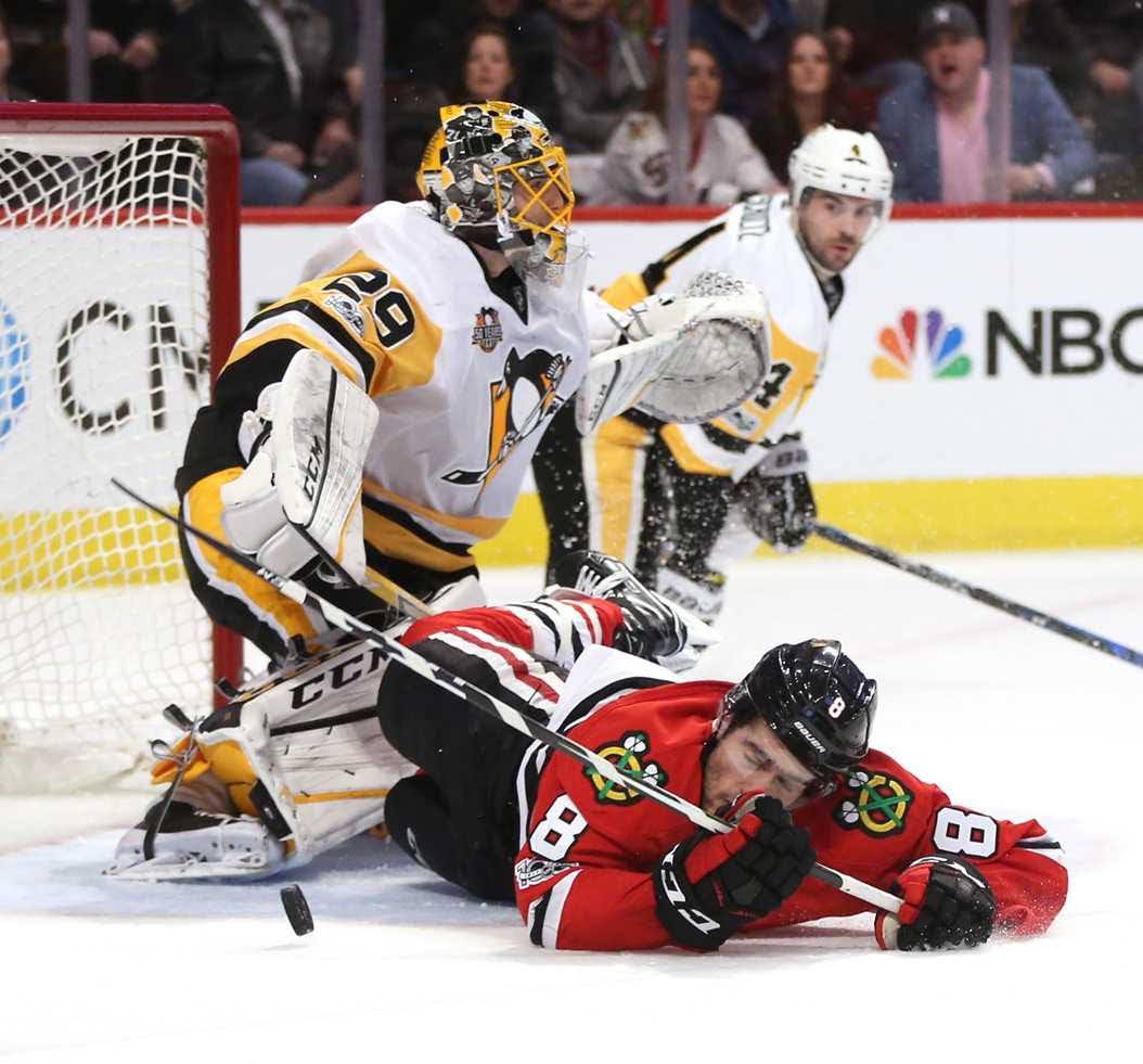 Marc-Andre Fleury (29) blocks Chicago Blackhawks' Nick Schmaltz (8) from scoring.
