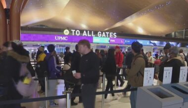 Passengers move through Pittsburgh International Airport as AAA forecasts record-breaking holiday travel