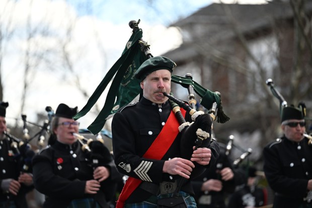 The MacKay Pipe Band performs in the Allentown St. Patrick's Day Parade on Sunday, March 17, 2024.(Amy Shortell / The Morning Call)