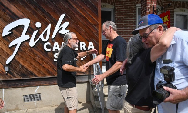 Fisk Camera Shop owners Billy Fisk IV and Barbara Scattene talk with longtime customers and friends Thursday, Aug. 28, 2025, at the shop in Wilson. The shop is closing a century after the siblings' grandfather, William Fisk II, opened it the 1910s or '20s. (Amy Shortell/The Morning Call)