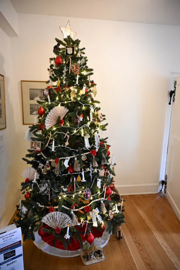 The Victorian tree is seen Sunday, Dec. 7, 2025, at the Moravian Museum of Bethlehem in the 1741 Gemeinhaus in Bethlehem during the "Trees of Historic Bethlehem" exhibition. The show, presented by Historic Bethlehem Museums & Sites, is back for the 2025 holiday season with a collection of the top Christmas trees and themes of the past 20 years. It runs through Jan. 11. (Amy Shortell/The Morning Call)