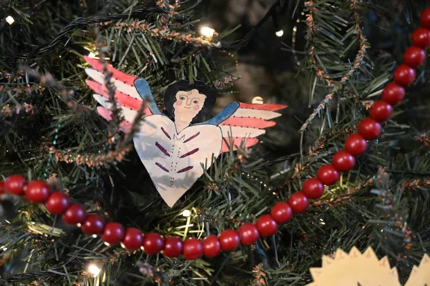 The Scherenschnitte tree is seen Sunday, Dec. 7, 2025, at the Moravian Museum of Bethlehem in the Single Sisters' House in Bethlehem during the "Trees of Historic Bethlehem" exhibition. The show, presented by Historic Bethlehem Museums & Sites, is back for the 2025 holiday season with a collection of the top Christmas trees and themes of the past 20 years. It runs through Jan. 11. (Amy Shortell/The Morning Call)