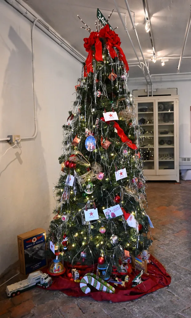 The Miracle on 34rth Street tree is seen Sunday, Dec. 7, 2025, at the Moravian Museum of Bethlehem in the Single Sisters' House in Bethlehem during the "Trees of Historic Bethlehem" exhibition. The show, presented by Historic Bethlehem Museums & Sites, is back for the 2025 holiday season with a collection of the top Christmas trees and themes of the past 20 years. It runs through Jan. 11. (Amy Shortell/The Morning Call)