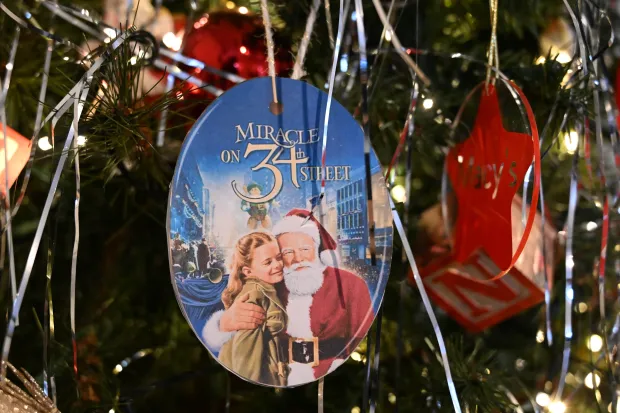 The Miracle on 34rth Street tree is seen Sunday, Dec. 7, 2025, at the Moravian Museum of Bethlehem in the Single Sisters' House in Bethlehem during the "Trees of Historic Bethlehem" exhibition. The show, presented by Historic Bethlehem Museums & Sites, is back for the 2025 holiday season with a collection of the top Christmas trees and themes of the past 20 years. It runs through Jan. 11. (Amy Shortell/The Morning Call)