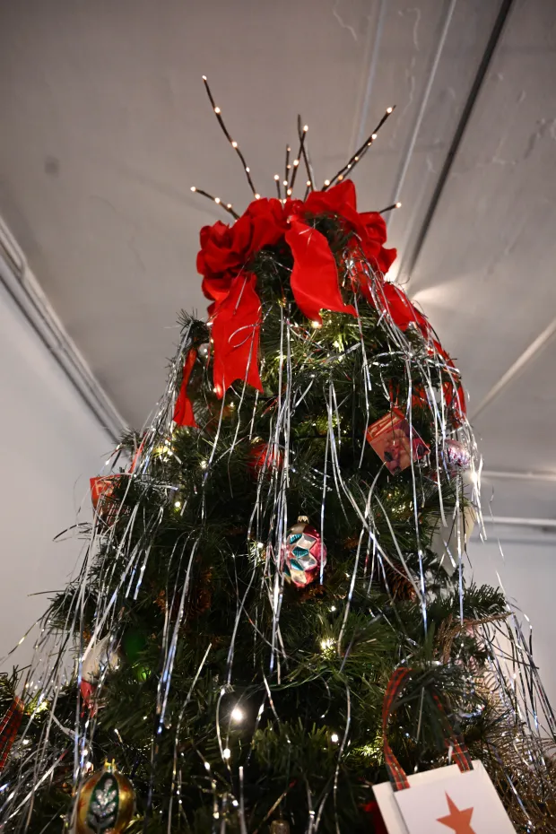 The Miracle on 34rth Street tree is seen Sunday, Dec. 7, 2025, at the Moravian Museum of Bethlehem in the Single Sisters' House in Bethlehem during the "Trees of Historic Bethlehem" exhibition. The show, presented by Historic Bethlehem Museums & Sites, is back for the 2025 holiday season with a collection of the top Christmas trees and themes of the past 20 years. It runs through Jan. 11. (Amy Shortell/The Morning Call)