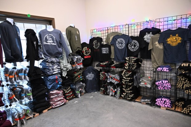 Merchandise is for sale at the Bethlehem mounted police unit's gift shop during the Holiday with the Horses open house Sunday, Dec. 7, 2025, at the unit's barn. (Amy Shortell/The Morning Call)