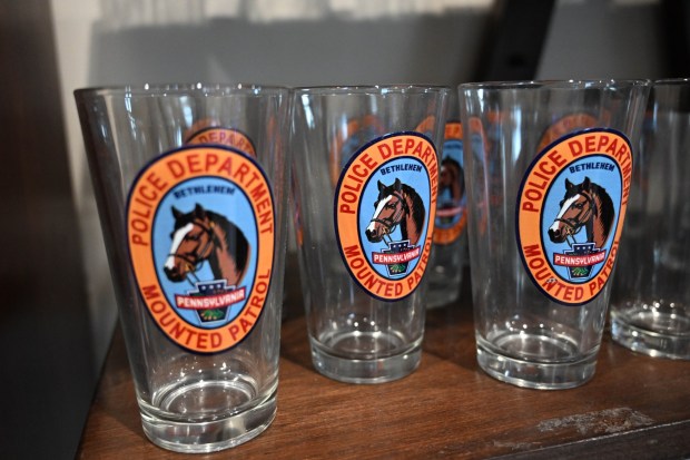 Merchandise is for sale at the Bethlehem mounted police unit's gift shop during the Holiday with the Horses open house Sunday, Dec. 7, 2025, at the unit's barn. (Amy Shortell/The Morning Call)