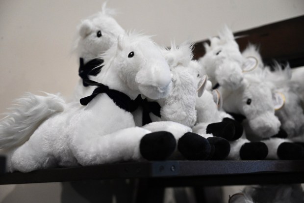 Merchandise is for sale at the Bethlehem mounted police unit's gift shop during the Holiday with the Horses open house Sunday, Dec. 7, 2025, at the unit's barn. (Amy Shortell/The Morning Call)
