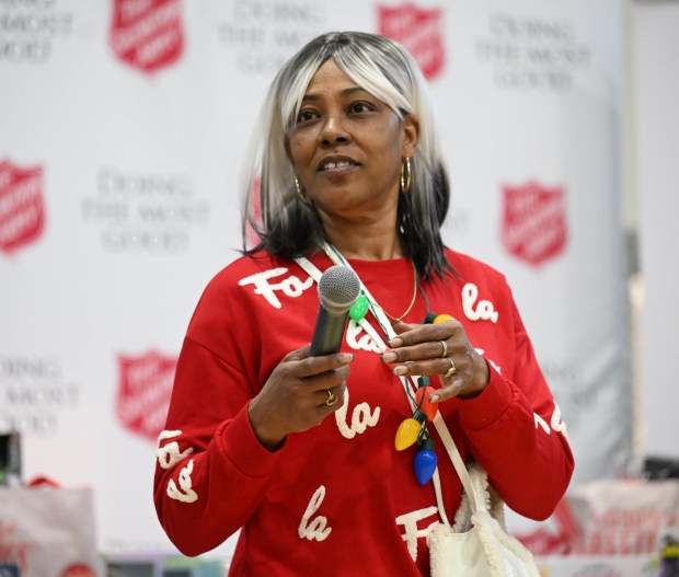 Tonya Johnson, All-Pro running back Saquon Barkley's mom and vice president of the Michael Ann and Saquon Barkley Hope Foundation, speaks Monday, Dec. 22, 2025, at the Salvation Army in Allentown. The foundation, Salvation Army and Ashley's Furniture joined to donate beds, mattresses and toys to Lehigh Valley families in need, including some whose homes were burned in recent fires. (Amy Shortell/The Morning Call)