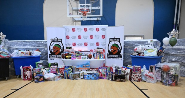 Toys and mattresses are seen prior to being handed out Monday, Dec. 22, 2025, at the Salvation Army in Allentown. The foundation, Salvation Army and Ashley's Furniture joined to donate beds, mattresses and toys to Lehigh Valley families in need, including some whose homes were burned in recent fires. (Amy Shortell/The Morning Call)