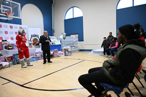 Tonya Johnson, All-Pro running back Saquon Barkley's mom and vice president of the Michael Ann and Saquon Barkley Hope Foundation, speaks Monday, Dec. 22, 2025, at the Salvation Army in Allentown. The foundation, Salvation Army and Ashley's Furniture joined to donate beds, mattresses and toys to Lehigh Valley families in need, including some whose homes were burned in recent fires. (Amy Shortell/The Morning Call)