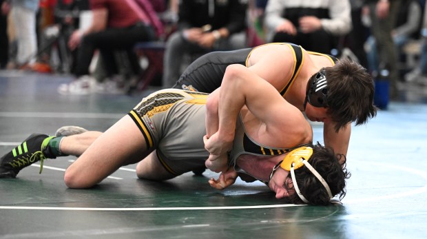 Freedom's Anthony Crisafulli wrestles Northwestern Lehigh's Trent Croll in the 145-pound bout Sunday, Dec. 28, 2025, during Day 1 of the Bethlehem Holiday Wrestling Classic at Liberty High School. (Amy Shortell/The Morning Call)