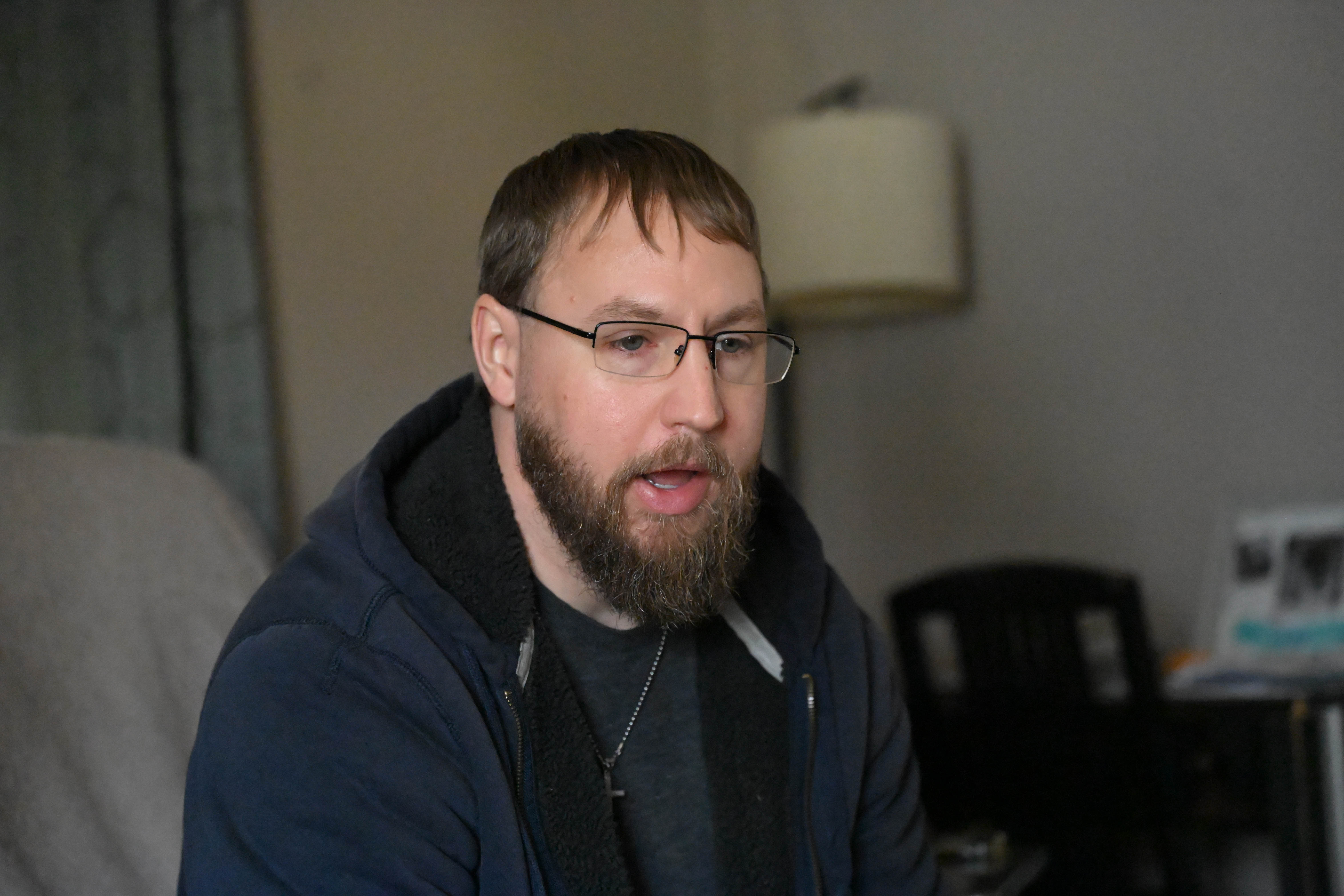 Matthew Wolfe speaks at his home Thursday, Nov. 20, 2025,...