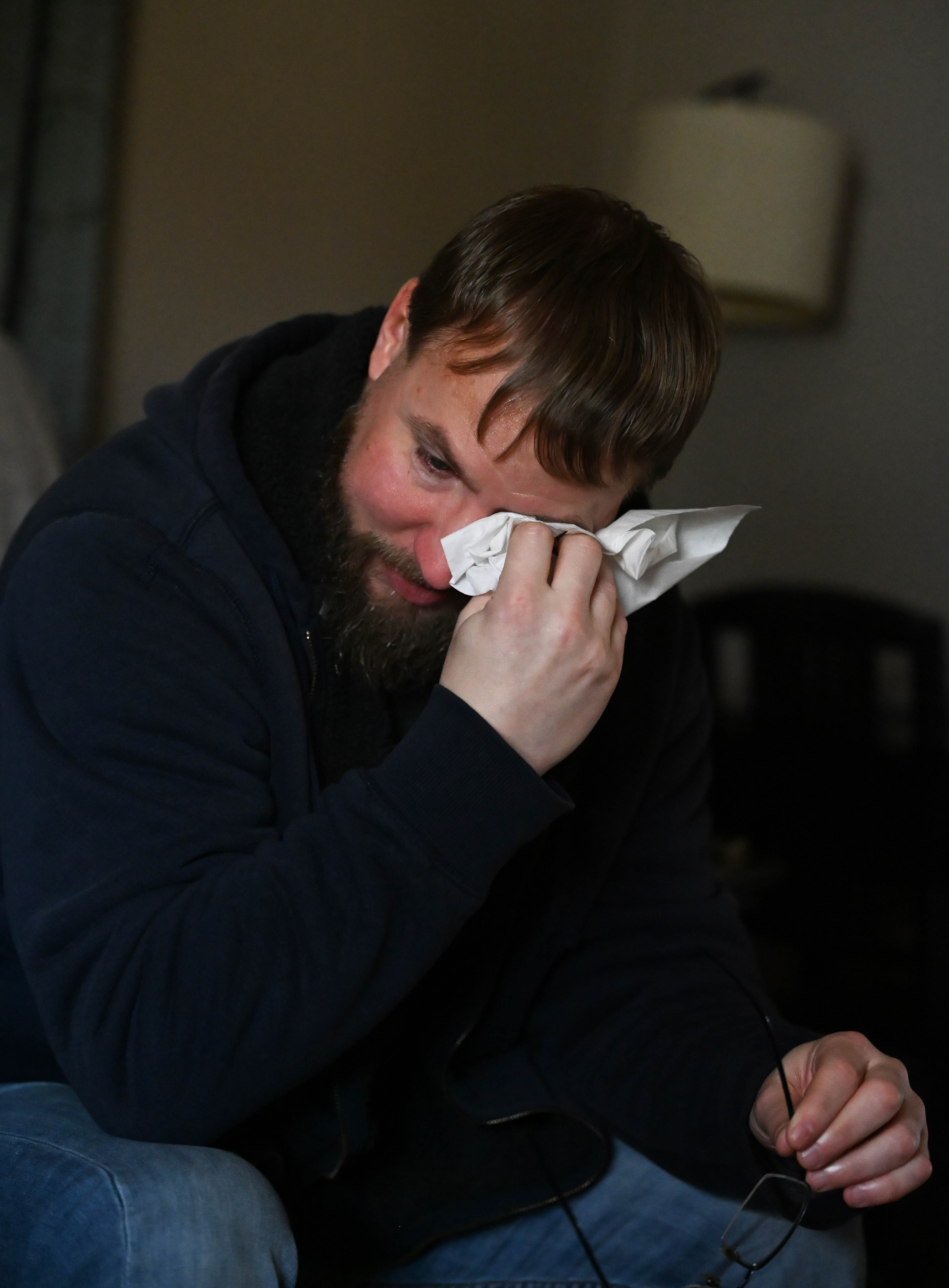 Matthew Wolfe becomes emotional while speaking at his home Thursday,...