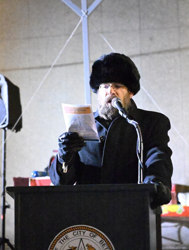 Rabbi Rabbi Yaacov Halperin speaks before leading a prayer Monday, Dec. 15, 2025, during a Hanukkah menorah lighting at Payrow Plaza in Bethlehem. Monday was the second night of the eight-day Jewish Festival of Lights. (Amy Shortell/The Morning Call)