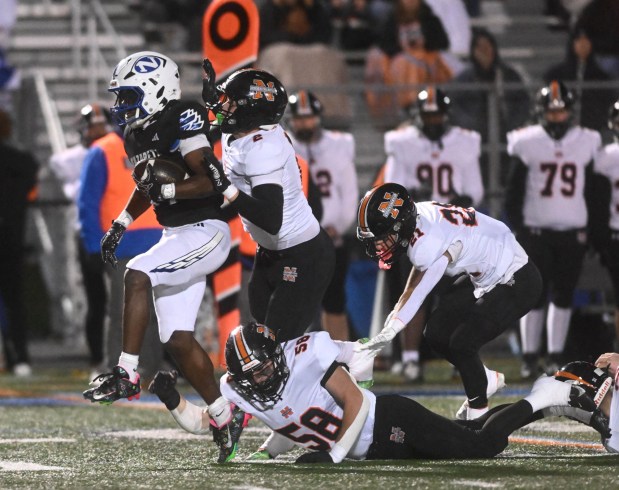 Nazareth's Marquez Wimberly runs the ball down the field Friday Oct.31,2025, against Northampton at Nazareth High School. (Amy Shortell/The Morning Call)