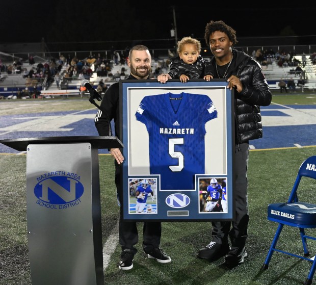 Jahan Dotson is honored during a Nazareth Area High School football game as the school retires his number Friday, Oct. 10, 2025, in Nazareth. (Amy Shortell/The Morning Call)