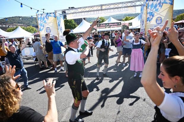 The group G.T.V. Almrausch leads dances Sunday, Oct. 5, 2025, at the 15th annual Oktoberfest at SteelStacks in Bethlehem. The festival continues Oct. 10-12. (Amy Shortell/The Morning Call)