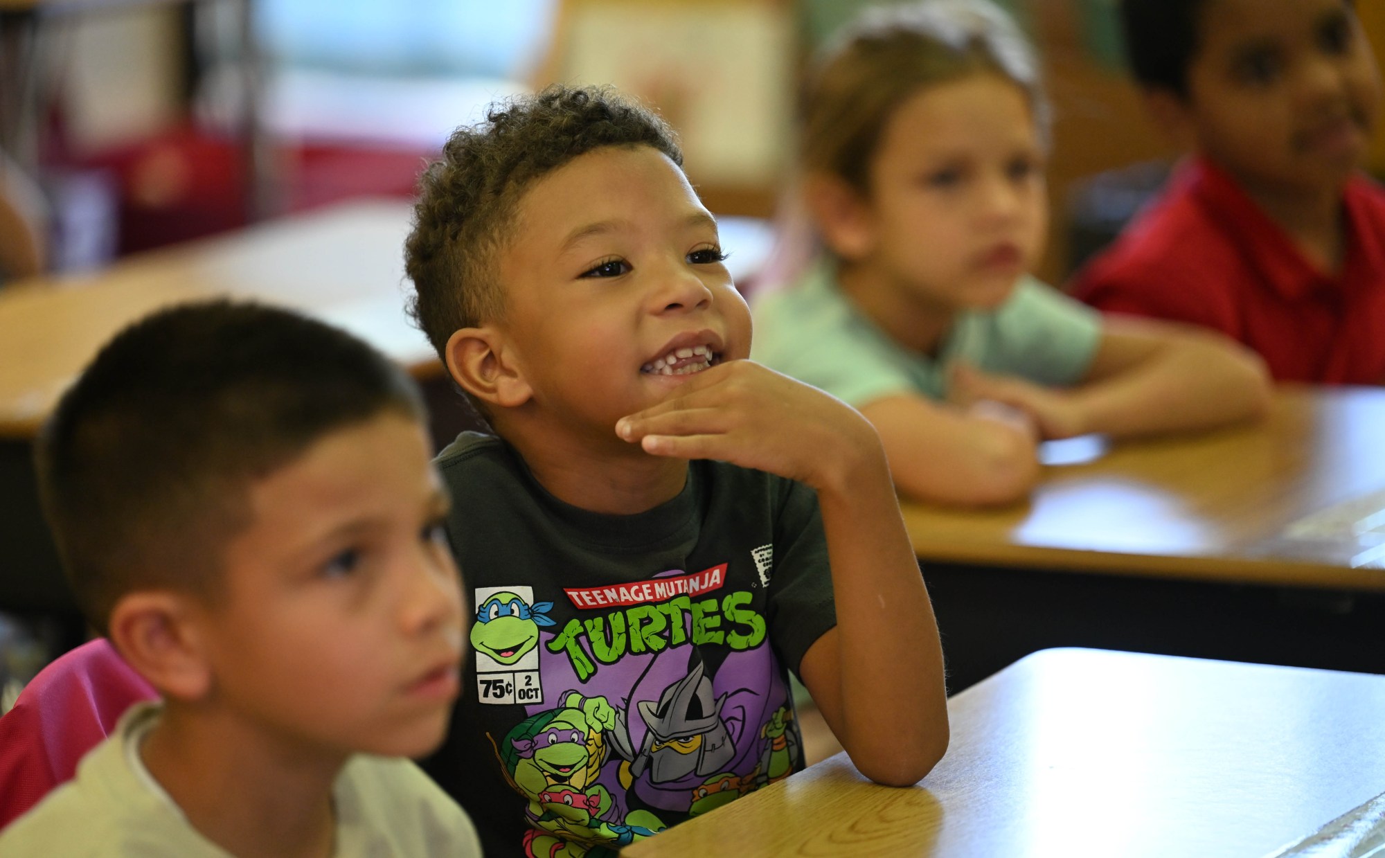 First-grade student Imar mimics the sounds teacher Dara Ackerman uses as she teaches a lesson on phonics to her class Wednesday, Sept. 3, 2025, at Salisbury Elementary School. The school district has launched new protocols to help identify students who may be struggling with reading and provide them with additional help. (Amy Shortell/The Morning Call)