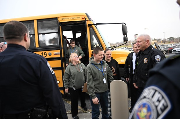 Nineteen children get ready to shop with their Lehigh-Northampton Airport Authority Police Department partners Saturday, Dec. 6, 2025, at Target in Allentown during Shop with an Airport Cop. (Amy Shortell/The Morning Call)