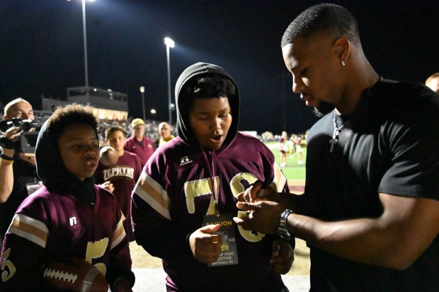Saquon Barkley interacts with fans as he is inducted into the Whitehall Hall of Fame on Friday, Sept. 5,2025, at halftime during a Whitehall High School football game in Whitehall Township. (Amy Shortell/The Morning Call)