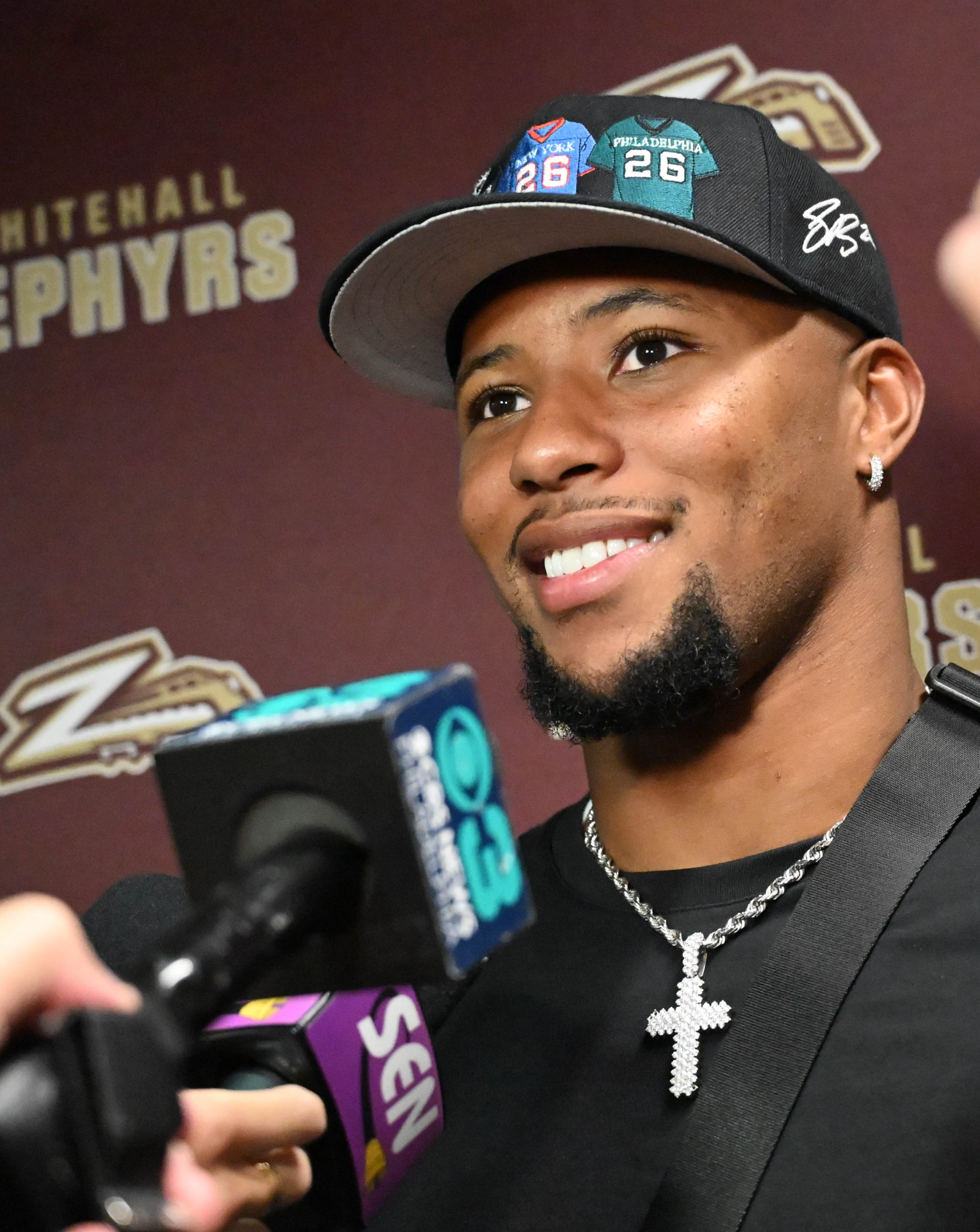 Saquon Barkley reacts as he is inducted into the Whitehall Hall of Fame on Friday, Sept. 5,2025, at halftime during a Whitehall High School football game in Whitehall Township. (Amy Shortell/The Morning Call)