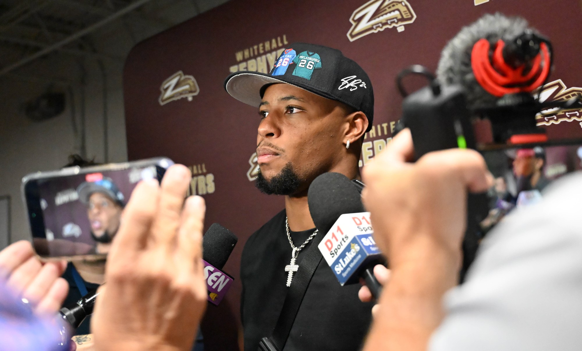 Saquon Barkley reacts as he is inducted into the Whitehall Hall of Fame on Friday, Sept. 5,2025, at halftime during a Whitehall High School football game in Whitehall Township. (Amy Shortell/The Morning Call)