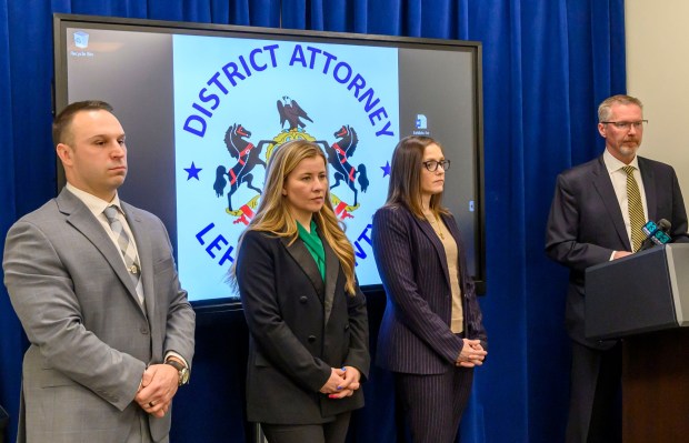 Trooper Steven M. Potynski Jr., Chief Deputy District Attorney Sara Moyer and Senior Deputy District Attorney Sarah K. Heimbach stand with Lehigh County District Attorney Gavin Holihan during a news conference Monday, Jan. 27, 2025, at the Lehigh County Courthouse. Holihan announced Joshua Dechant, 36, and Tracy Dechant, 42, were charged Sunday with endangering the welfare of minors and sent to Lehigh County Jail under $75,000 bail each. (April Gamiz/The Morning Call)