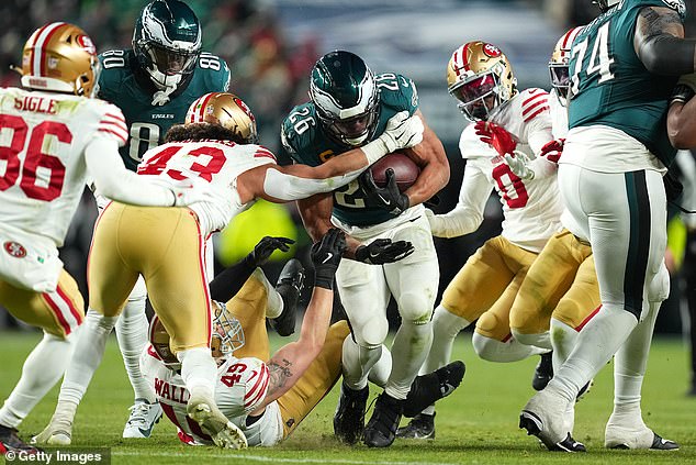 Eagles running back Saquon Barkely ran for 106 yards but appeared hurt in the fourth quarter