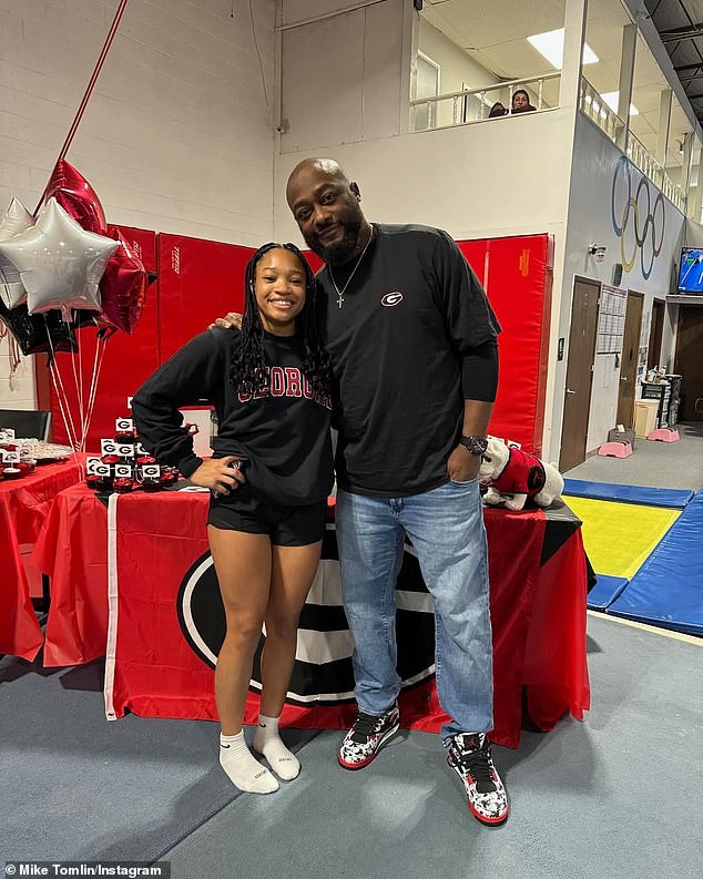 Georgia Bulldogs gymnast Harley Tomlin is pictured alongside her father Mike