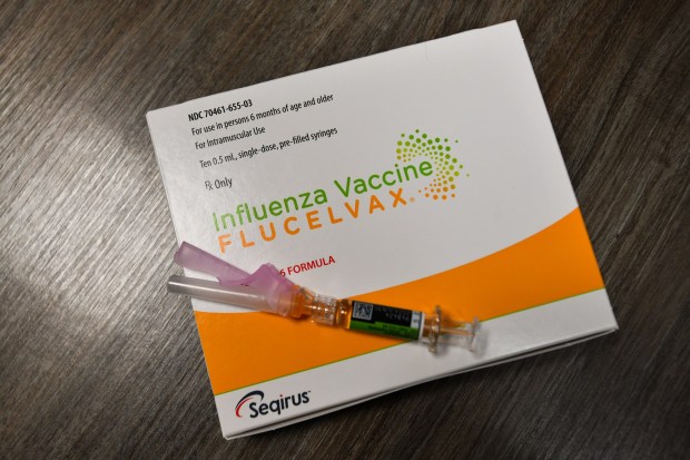 Flu shot packaging sits on a table at DePietro's Pharmacy in Dumore Friday, January 2, 2025. (SEAN MCKEAG / STAFF PHOTOGRAPHER)