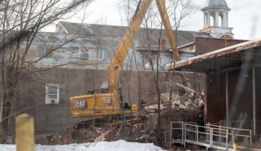 Part of West Side Hotel razed following December fire