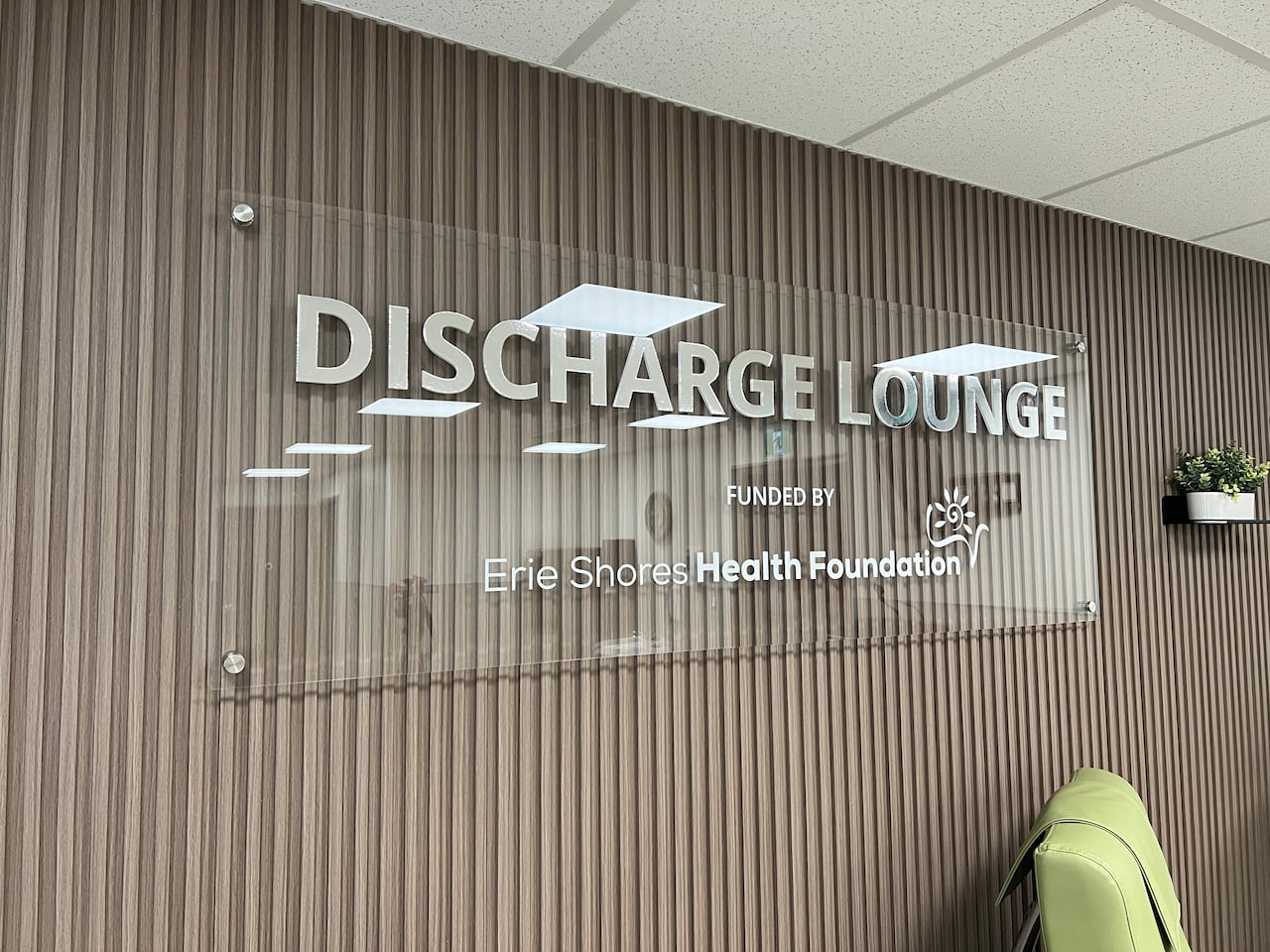 A board that reads Discharge Lounge funded by Erie Shores Health Foundation