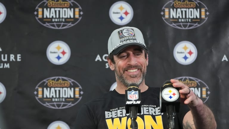 Pittsburgh Steelers quarterback Aaron Rodgers speaks during a news conference...