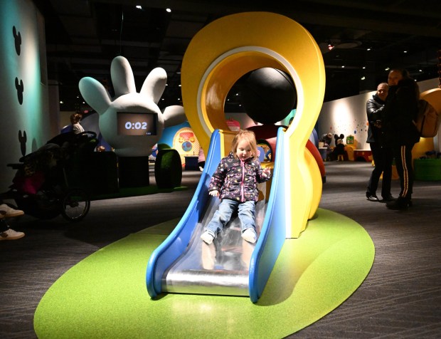 Bailey Albright, 2 1/2, goes down a slide in the Mickey Mouse Clubhouse exhibit Friday, Jan. 2, 2026, at the Da Vinci Science Center in Allentown. (Amy Shortell/The Morning Call)