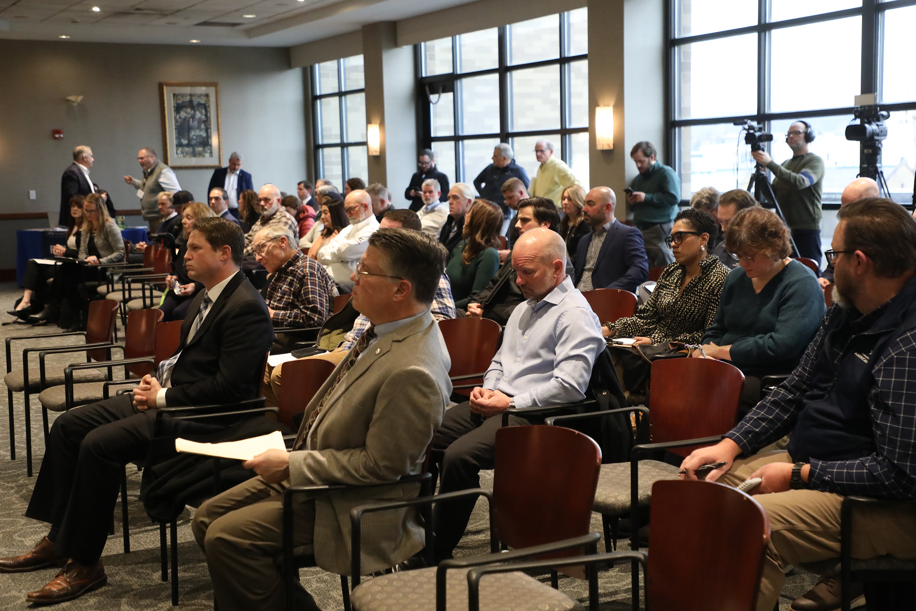 Community leaders and members list to testimonies during the one...