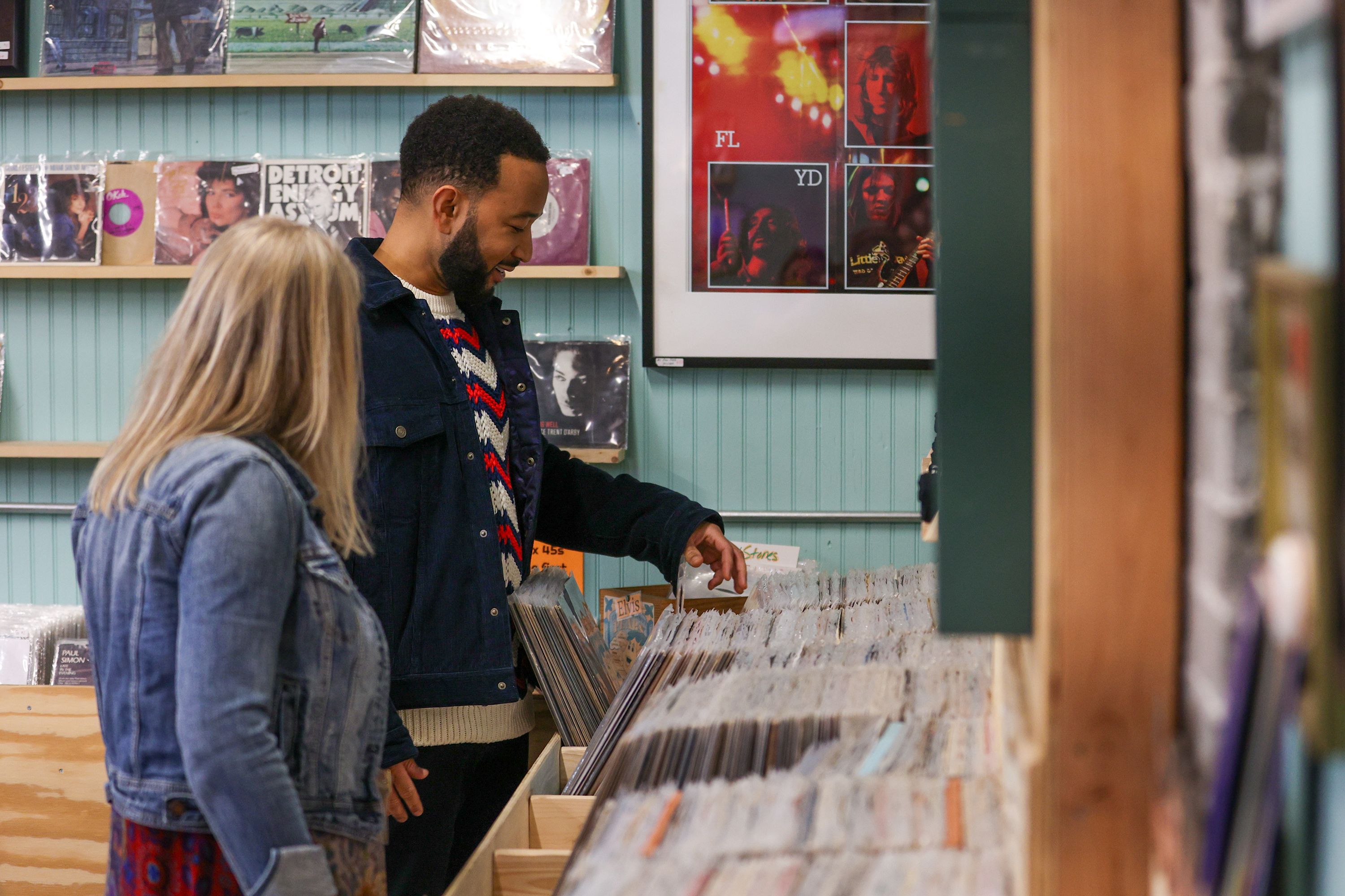 John Legend browses records at On&On in Scranton on Sunday,...