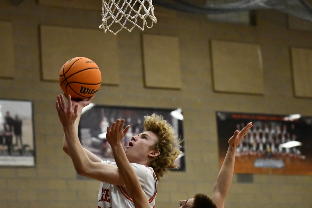 Garrett Owen led Erie boys basketball to victory over Mead