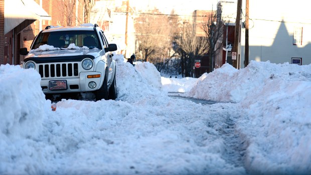 A snow-covered Liberty Street in Allentown on Sunday afternoon, Jan. 24, 2016. Lehigh Valley residents began the big cleanup after the Blizzard of 2016 dumped a record 31.9 inches of snow on the region. (Emily Paine/The Morning Call)