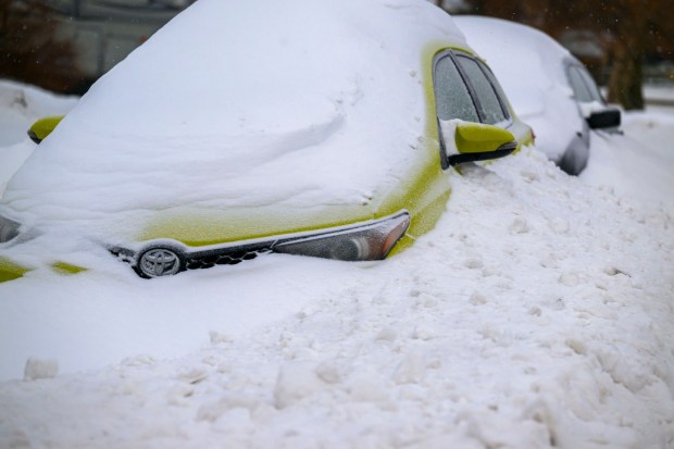 Cars on East Boulevard are covered in snow Monday, Jan. 26, 2026, in Bethlehem after Sunday's storm that dropped more than a foot of snow in some parts of the Lehigh Valley. (April Gamiz/The Morning Call)