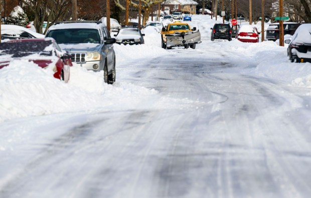 Snow plow trucks travel Monday, Jan. 26, 2026, in Bethlehem after Sunday's storm that dropped more than a foot of snow in some parts of the Lehigh Valley. (April Gamiz/The Morning Call)