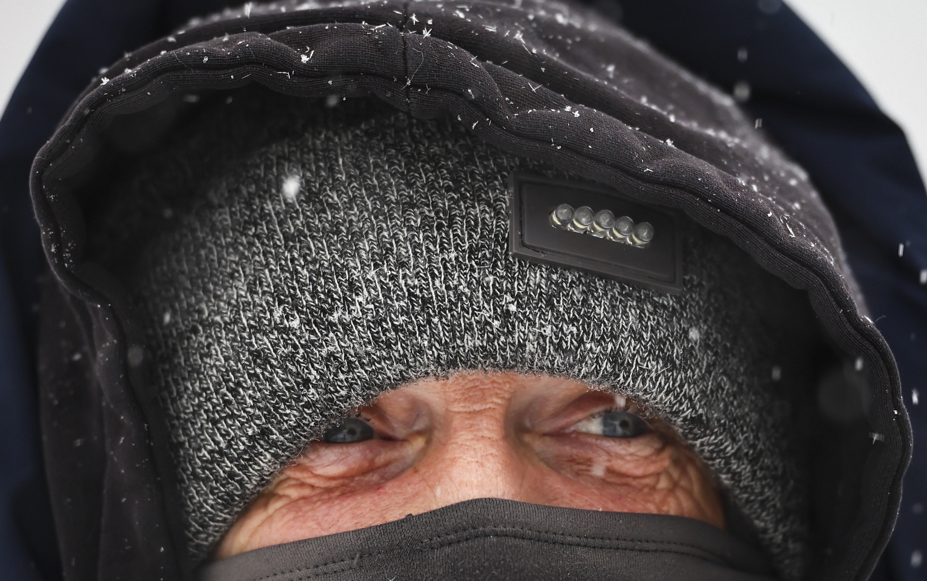 Tim Weadock, of Phillipsburg, protects himself from the frigid temperatures as he heads out to take a few photos near the Northampton Street Bridge about 9:10 a.m. on Sunday, Jan. 25, 2026.