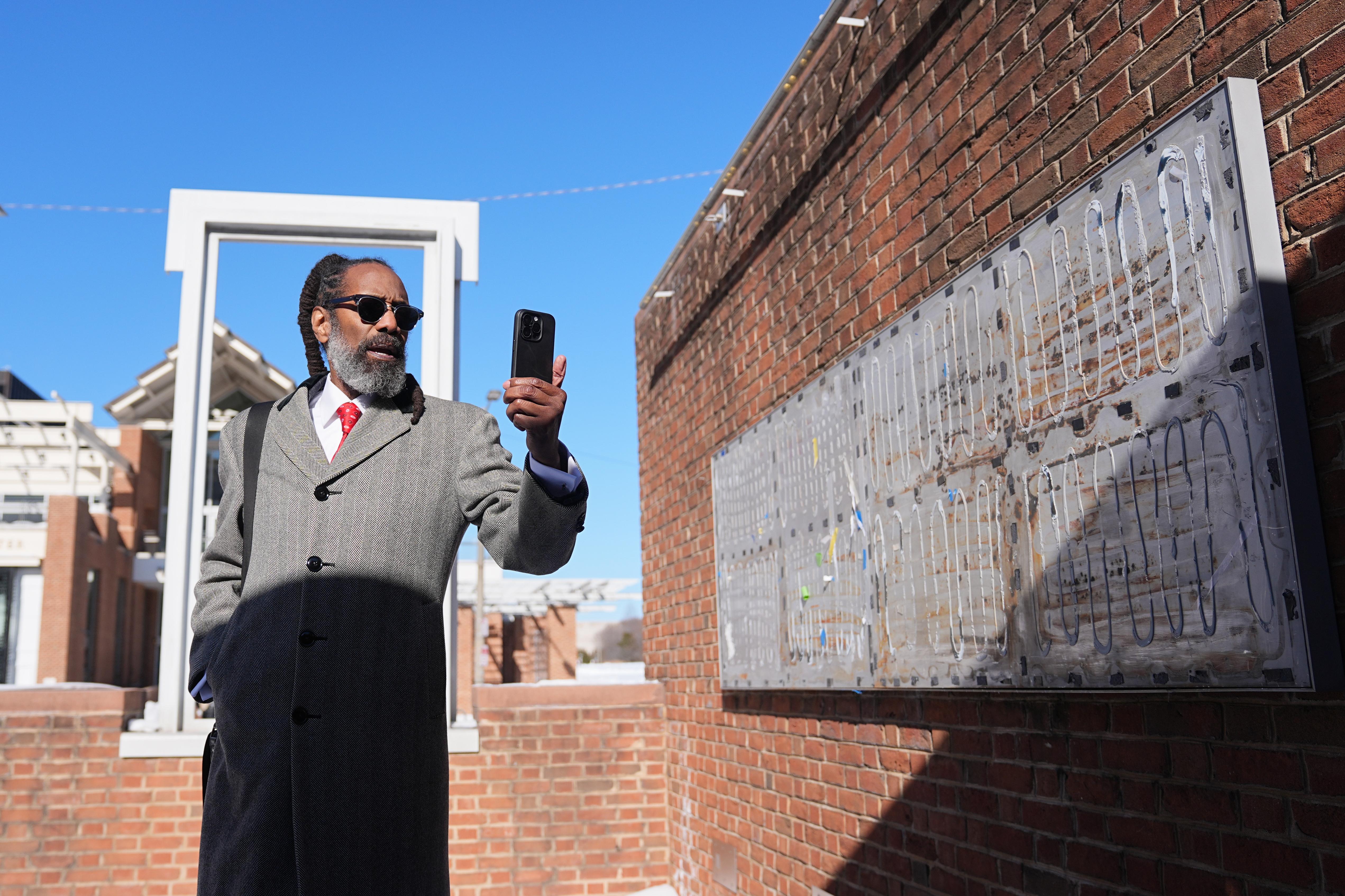 Attorney Michael Coard makes a social media post at the...