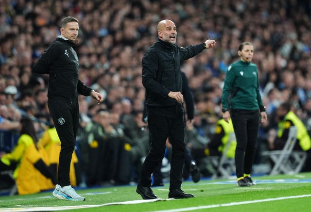 Manchester City assistant manager Pep Lijnders, left, alongside Pep Guardiola on the touchline