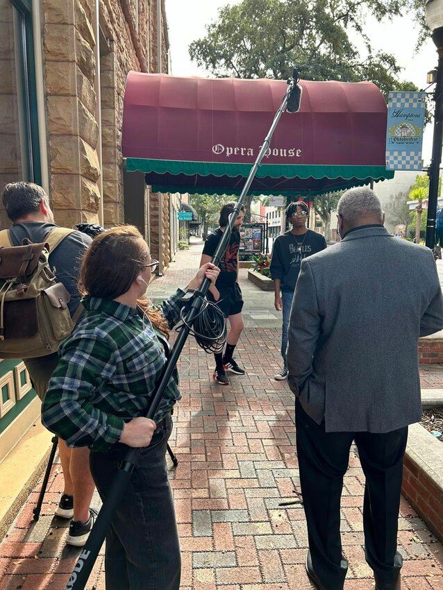 From left, Director Mark Williams, along with cast member Halsi Harris, on boom mic, film a scene of "Mary's Lake" with Austin McDuffie, who plays Sam, Carlos Waters, who plays Chris, and Kelvin Page, who plays Detective Campbell.